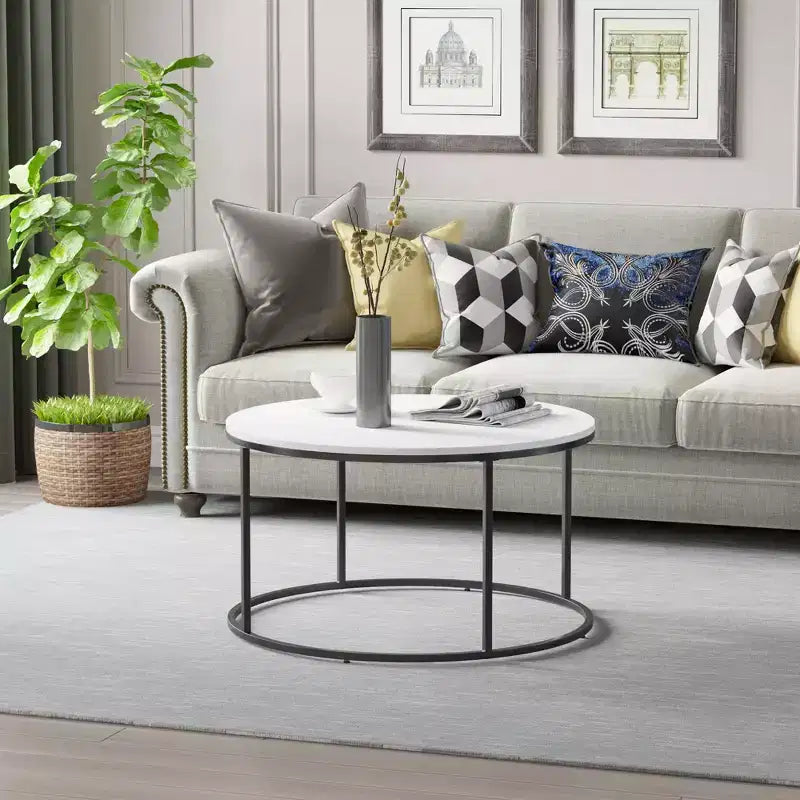 Tavolino rotondo con piano effetto legno bianco e struttura in metallo nero
